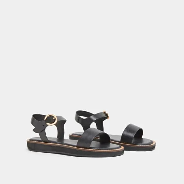 Platform sandals in black leather